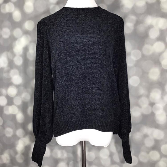 LuLaRoe Piper Sweater in solid black knit with ribbed neckline, hem, and extended cuffs featuring balloon sleeves displayed on mannequin against gray background.
