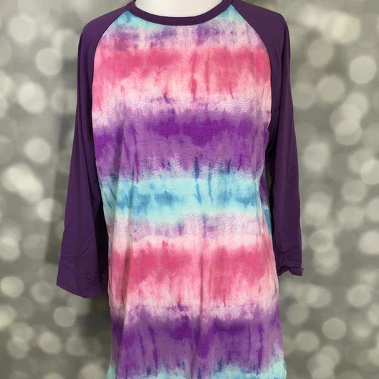 LuLaRoe Randy Tee with purple raglan sleeves and multicolor purple, pink, and aqua tie-dye style print in a relaxed long sleeve top on a mannequin