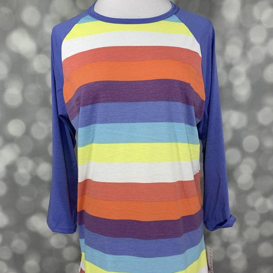 LuLaRoe Randy Tee with multicolor horizontal stripes and blue raglan sleeves on a mannequin against a blurred gray background