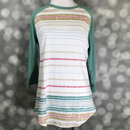 LuLaRoe Randy Tee with teal sleeves and multicolor distressed stripe print on a mannequin against a blurred gray background