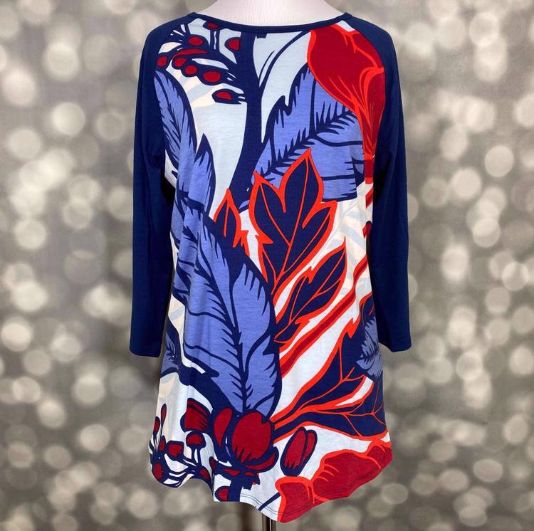 LuLaRoe Randy Tee with navy raglan sleeves and bold red, blue, and white abstract leaf botanical print, relaxed fit casual long sleeve top on a mannequin