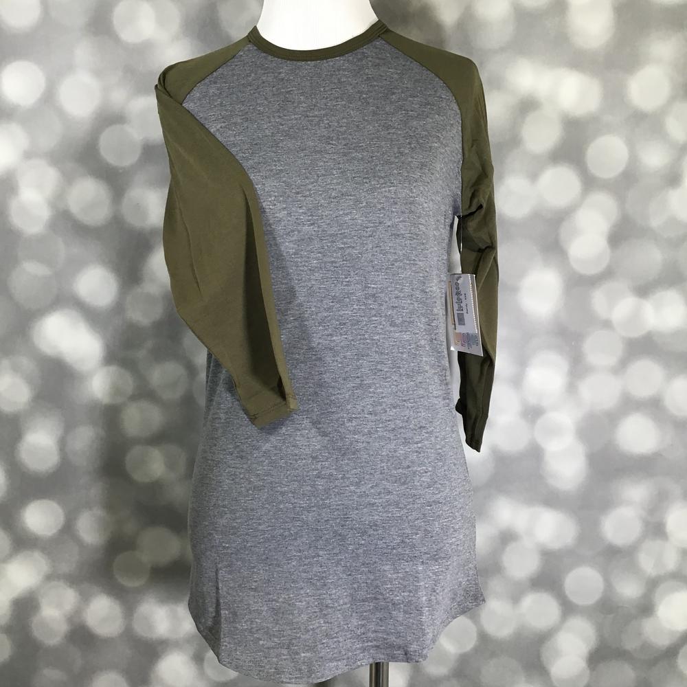 LuLaRoe Randy Tee with heather gray body and olive green long sleeves on a mannequin against a blurred background