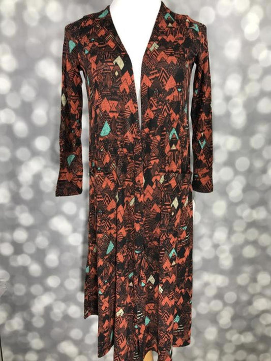 LuLaRoe Sarah Cardigan in rust and teal geometric arrow print, lightweight mid-calf cardigan with cropped long sleeves.