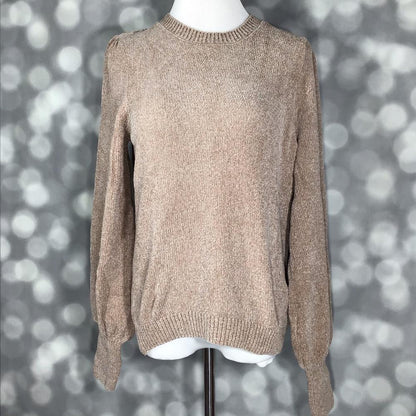 LuLaRoe solid oatmeal beige crewneck sweater with balloon sleeves and ribbed cuffs in a soft neutral knit on a mannequin against a blurred gray background
