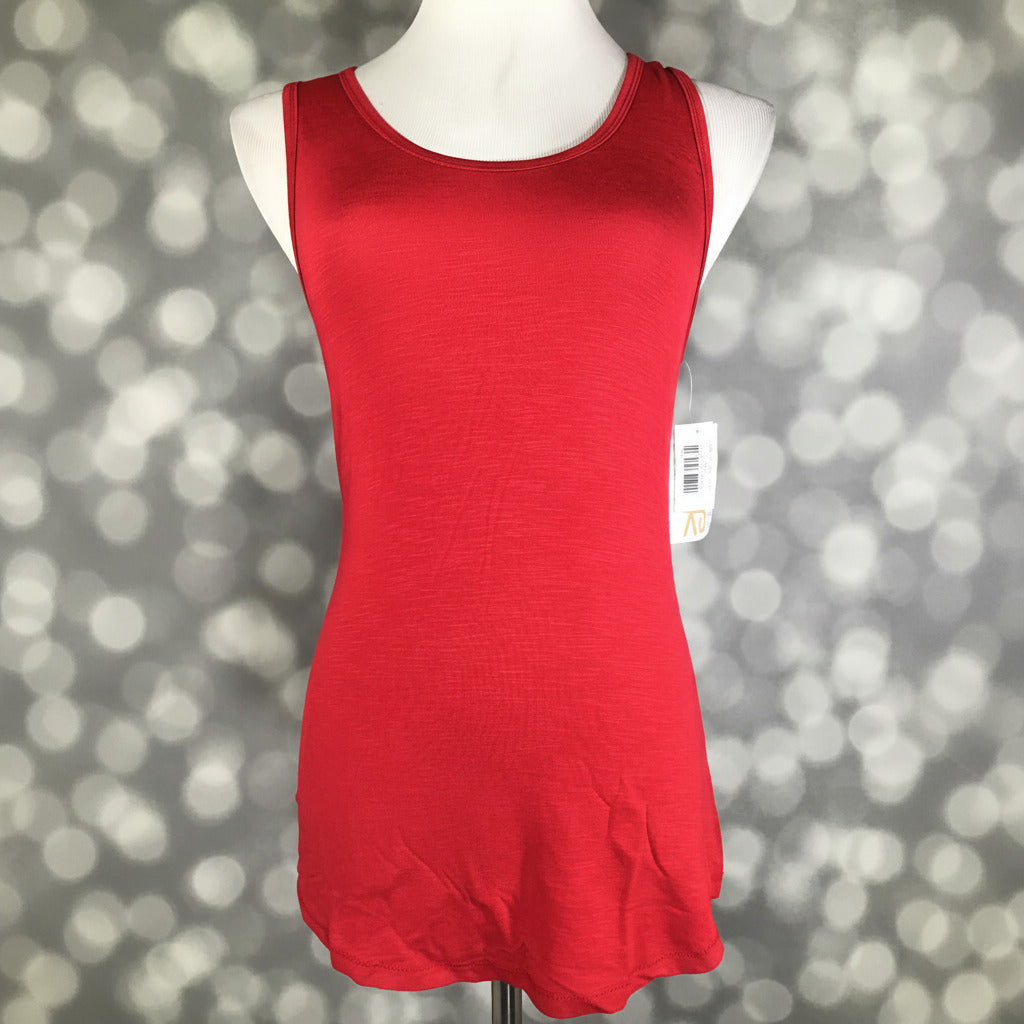 LuLaRoe bright red sleeveless tank top with scoop neckline and relaxed fit displayed on a mannequin with a blurred gray background
