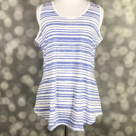 LuLaRoe tank top featuring distressed periwinkle blue and white horizontal stripes. Women's sleeveless tank with a relaxed fit and coastal-inspired nautical stripe pattern for casual summer outfits on a mannequin against a blurred background