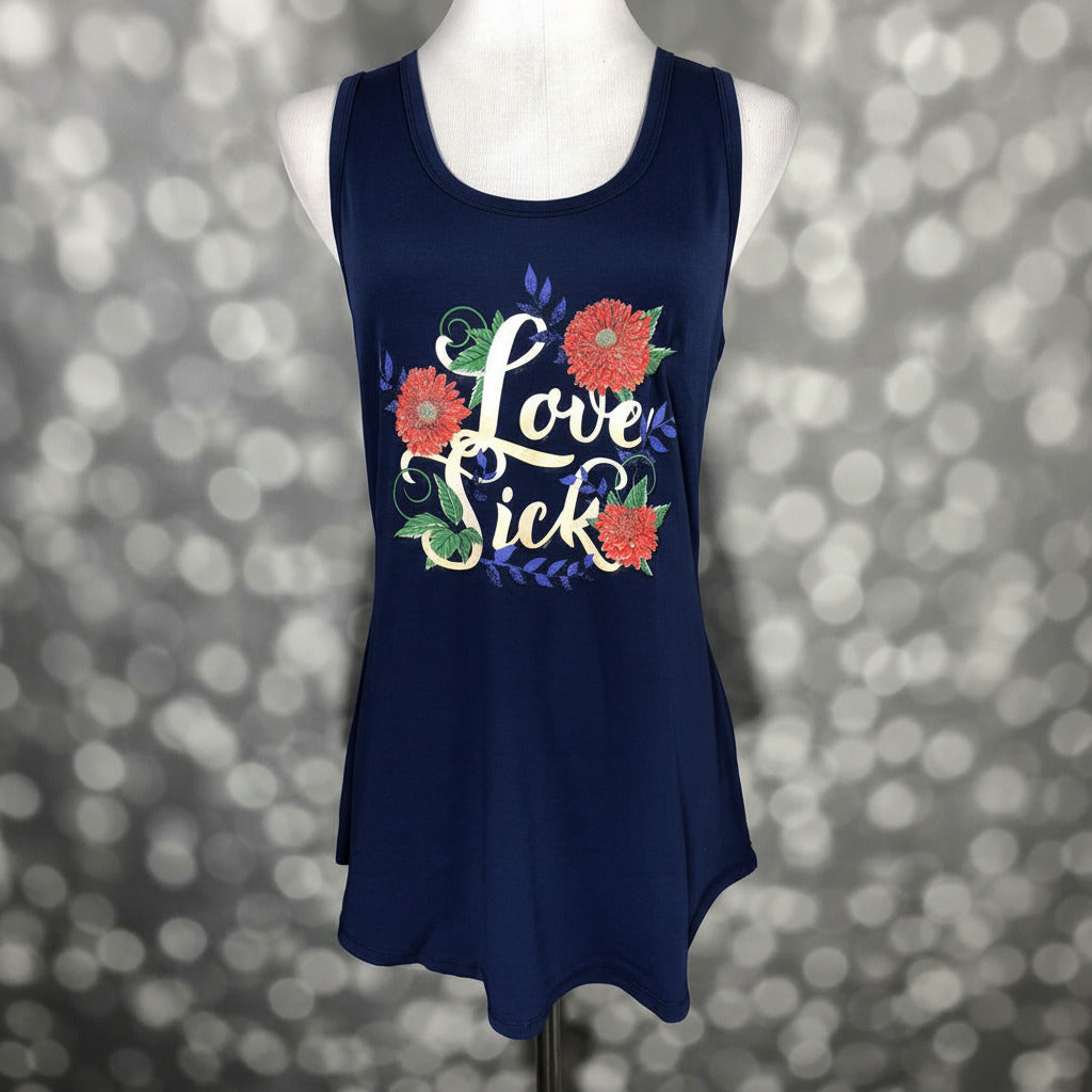 LuLaRoe navy sleeveless tank top with “Love Sick” text and floral graphic design, scoop neckline, and relaxed fit displayed on a mannequin against a gray blurred background