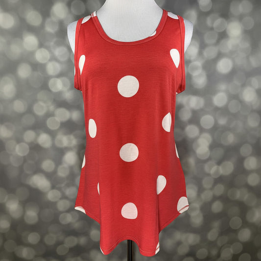 LuLaRoe red sleeveless tank top with large white polka dots, scoop neckline, and relaxed fit displayed on a mannequin against a blurred gray background