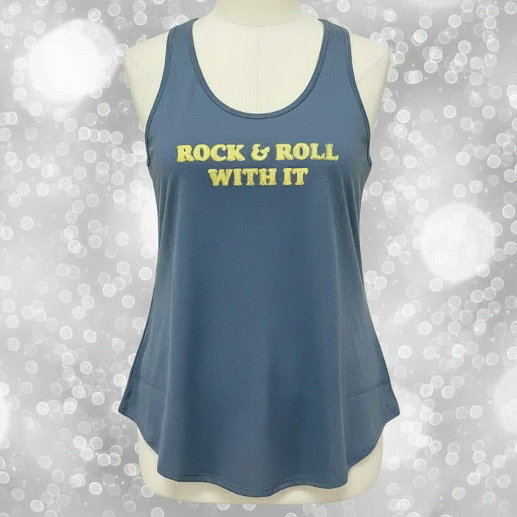 LuLaRoe slate blue sleeveless tank top with “Rock & Roll With It” graphic text, scoop neckline, and relaxed fit displayed on a mannequin on a blurred background