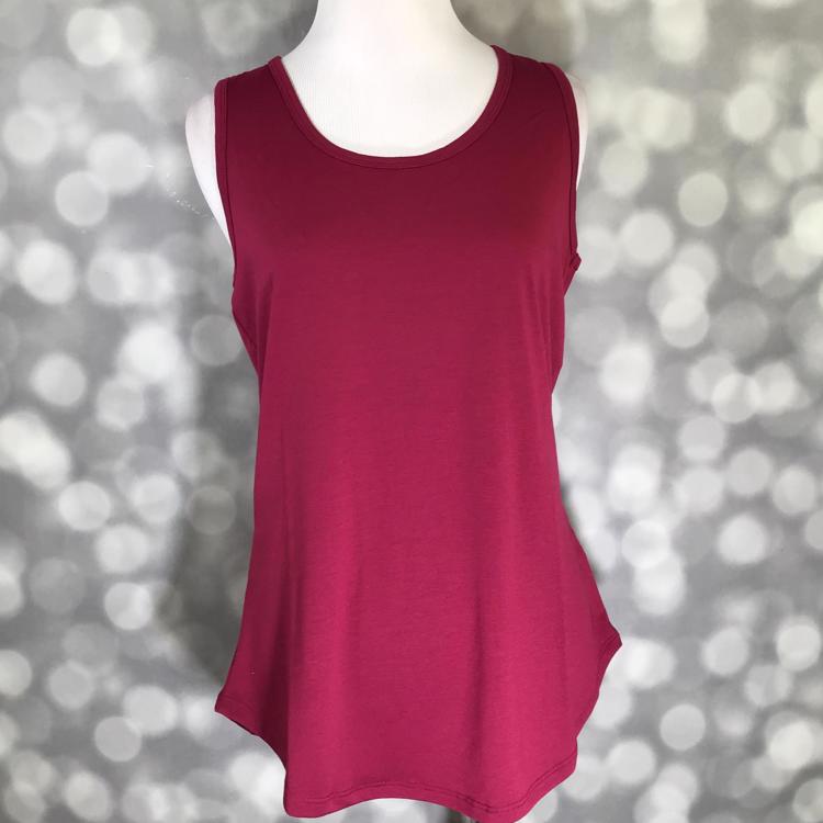 LuLaRoe solid deep red tank top in a Beaujolais wine tone, featuring a scoop neckline, sleeveless design, and relaxed fit displayed on a mannequin