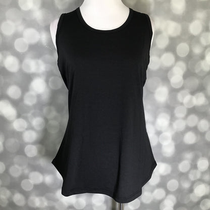 LuLaRoe solid black tank top with scoop neckline, sleeveless design, and relaxed fit displayed on a mannequin against a blurred bokeh background