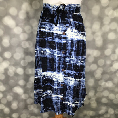 LuLaRoe Marsha Skirt with button-front detail featuring a black and blue abstract crosshatch print with elastic waistband and drawstring tie on a mannequin against a blurred background