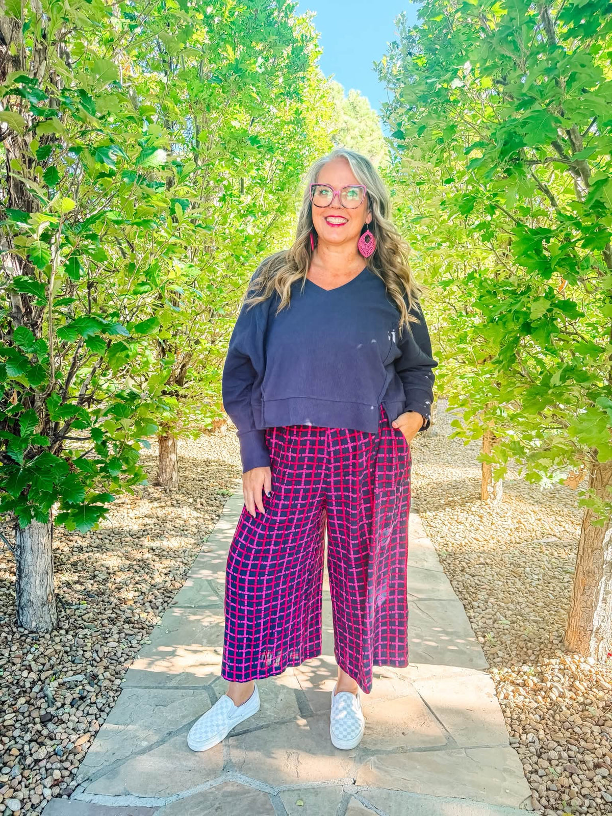 Lifestyle view 1 of the LuLaRoe Wendy Easy Barrel Pull-On Pant in Solid Navy Blue