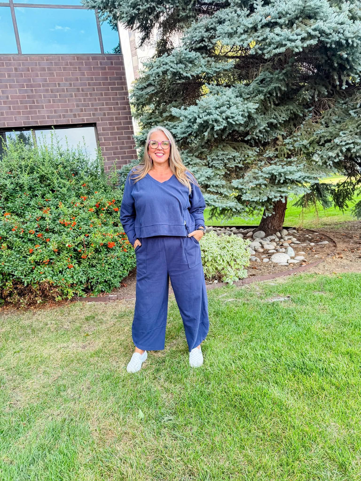 Lifestyle view 2 of the LuLaRoe Wendy Easy Barrel Pull-On Pant in Solid Navy Blue