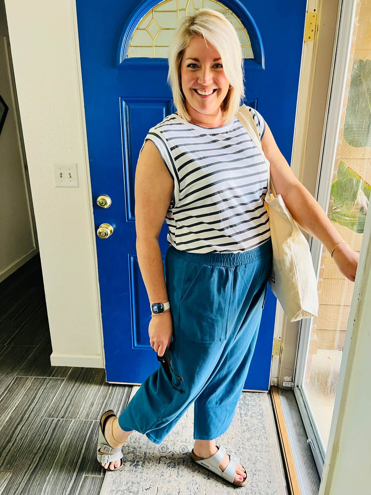 Lifestyle view 3 of the LuLaRoe Wendy Easy Barrel Pull-On Pant in Solid Ocean Blue