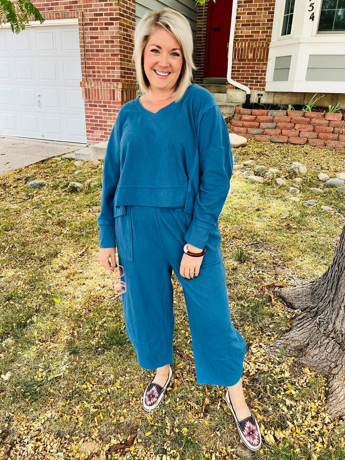 Lifestyle view 1 of the LuLaRoe Wendy Easy Barrel Pull-On Pant in Solid Ocean Blue