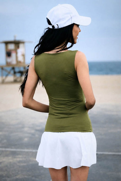 Model wearing the LuLaRoe Robyn Fitted Tank in solid olive green