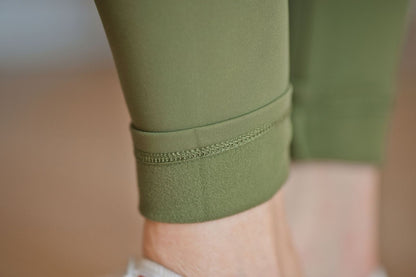 LuLaRoe WarmTech fleece-lined leggings solid olive green - detail and lifestyle view 6