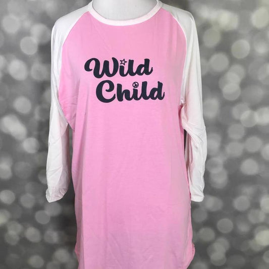 LuLaRoe Randy Tee Wild Child graphic top with pink body, white sleeves, and relaxed fit on a mannequin
