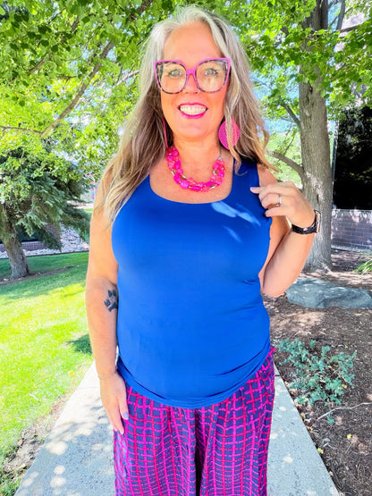 Model wearing the LuLaRoe Robyn Fitted Tank in solid royal blue