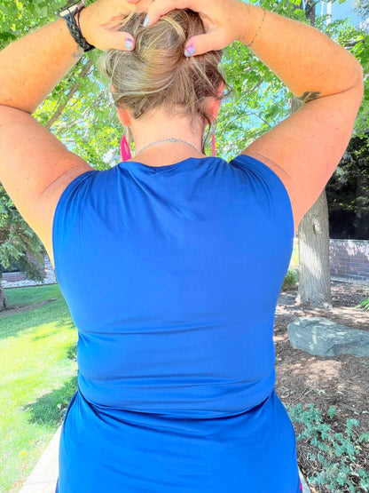 Model wearing the LuLaRoe Robyn Fitted Tank in solid royal blue