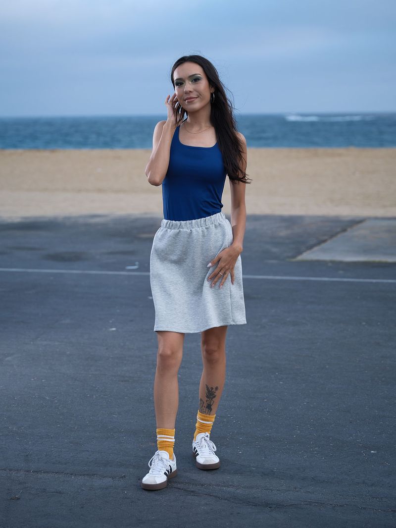 Model wearing the LuLaRoe Robyn Fitted Tank in solid royal blue