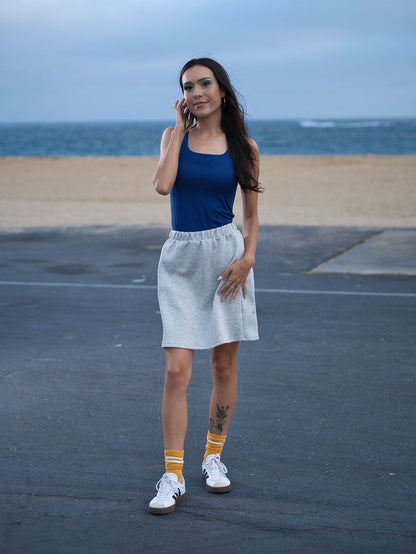 Model wearing the LuLaRoe Robyn Fitted Tank in solid royal blue