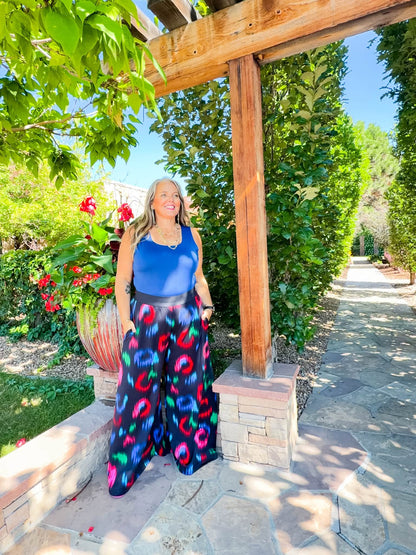 Model wearing the LuLaRoe Robyn Fitted Tank in solid royal blue