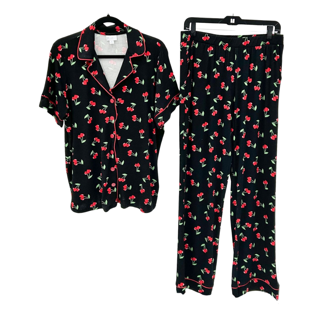 LuLaRoe Serene Set in black cherry print with red cherries and green stems, featuring a relaxed button-front top with red piping and coordinating pull-on lounge pants. against a white background