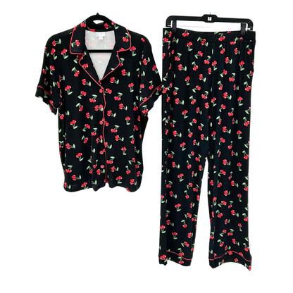 LuLaRoe Serene Set in black cherry print with red cherries and green stems, featuring a relaxed button-front top with red piping and coordinating pull-on lounge pants. against a white background
