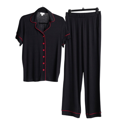 LuLaRoe Serene Set in solid black with red contrast piping, featuring a relaxed button-front top and coordinating pull-on lounge pants for elevated everyday comfort on a white background