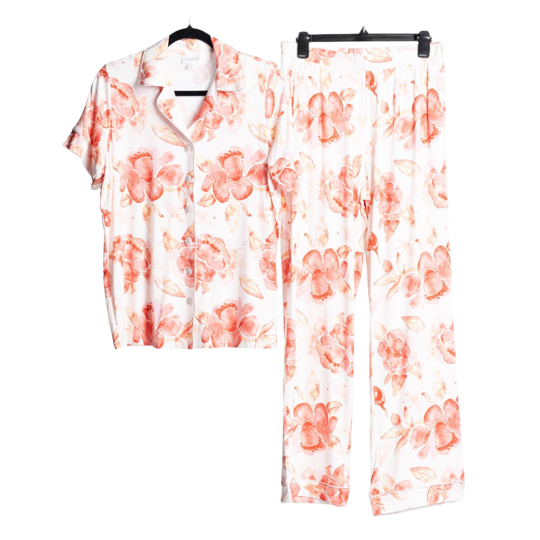 LuLaRoe Serene Set in white and peach floral print with watercolor-style blossoms, styled as a relaxed button-front top and coordinating pull-on lounge pants against a white background