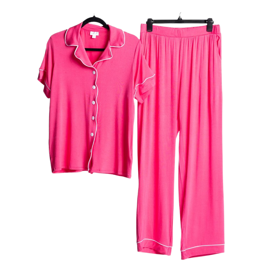 LuLaRoe Serene Set in solid pink with white piping, featuring a relaxed button-front top and coordinating pull-on lounge pants for elevated everyday comfort against a white background