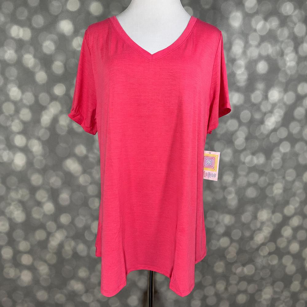 LuLaRoe Christy T in Solid Electric Pink featuring a vibrant fuchsia pink solid color, relaxed fit, V-neckline, short sleeves, and versatile everyday styling for women.