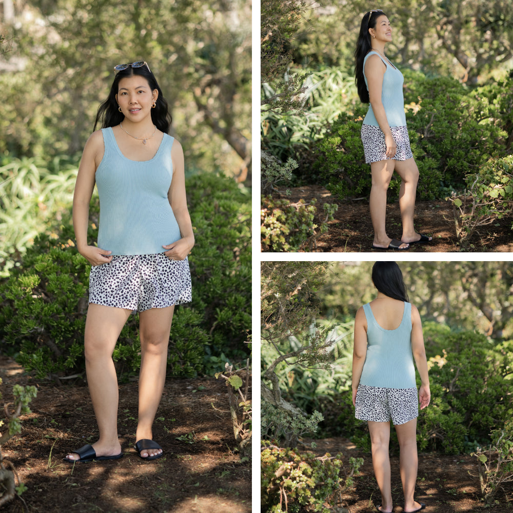 LuLaRoe Maydene Scallop Edge Tank in Solid Powder Blue with rib knit fabric, fitted silhouette, and scalloped neckline and arm openings. Alternate product image.