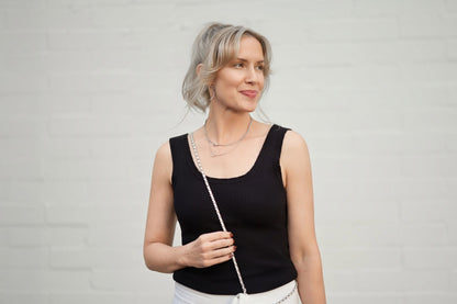 LuLaRoe Maydene Scallop Edge Tank in Solid Black with rib knit fabric, fitted silhouette, and scalloped neckline and arm openings. Alternate product image.