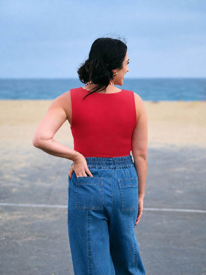 Model wearing the LuLaRoe Robyn Fitted Tank in solid crimson red