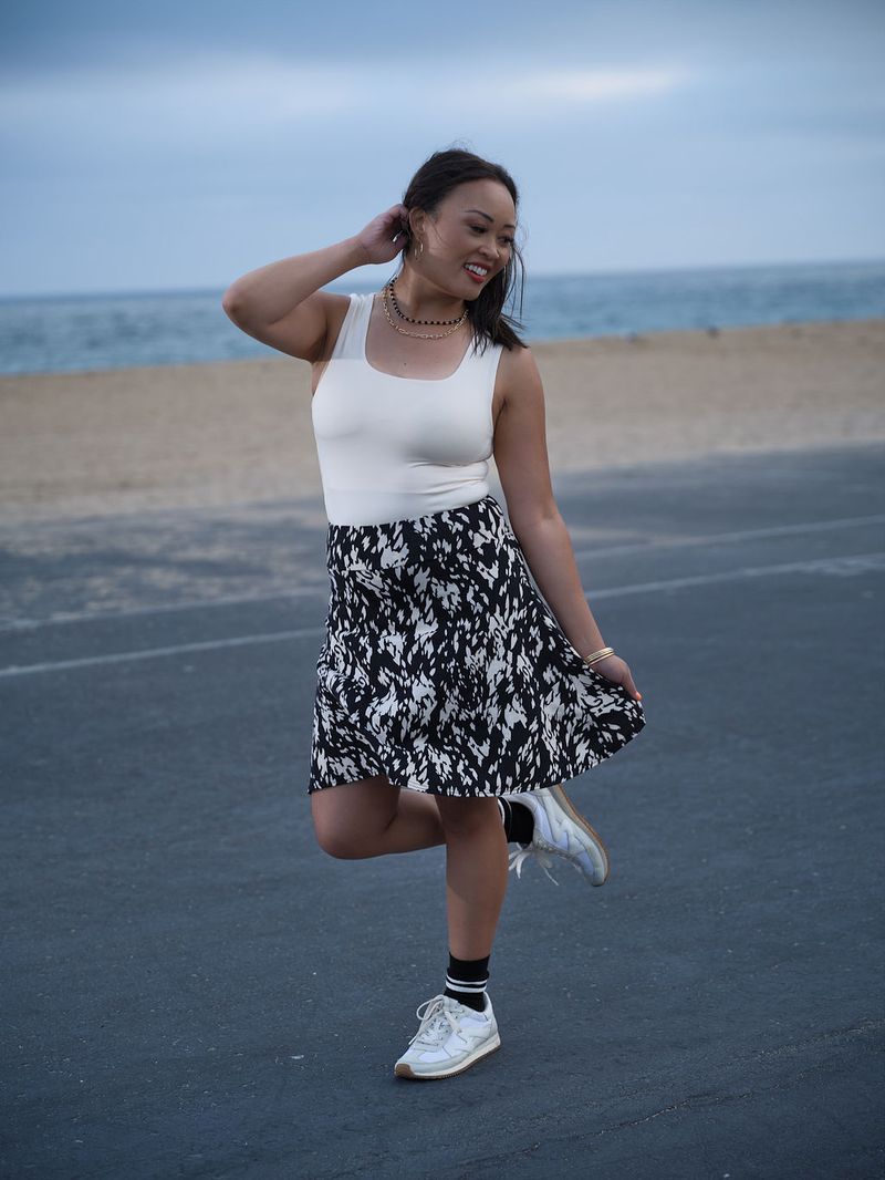Model wearing the LuLaRoe Robyn Fitted Tank in solid stone taupe