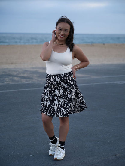 Model wearing the LuLaRoe Robyn Fitted Tank in solid stone taupe